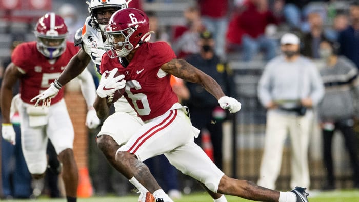 Alabama wide receiver DeVonta Smith (6) breaks free for a touchdown against Auburn at Bryant-Denny Stadium in the Iron Bowl.
